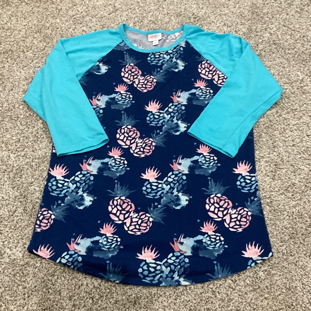 Lularoe blue with pineapple design top, size large